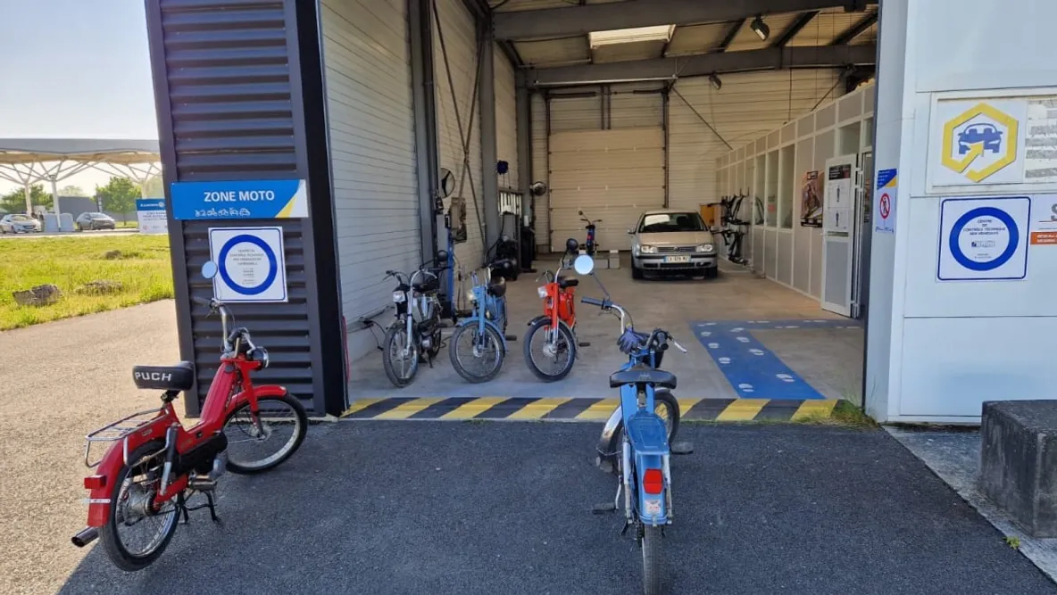 Technical check and servicing of a vintage moped before a ride